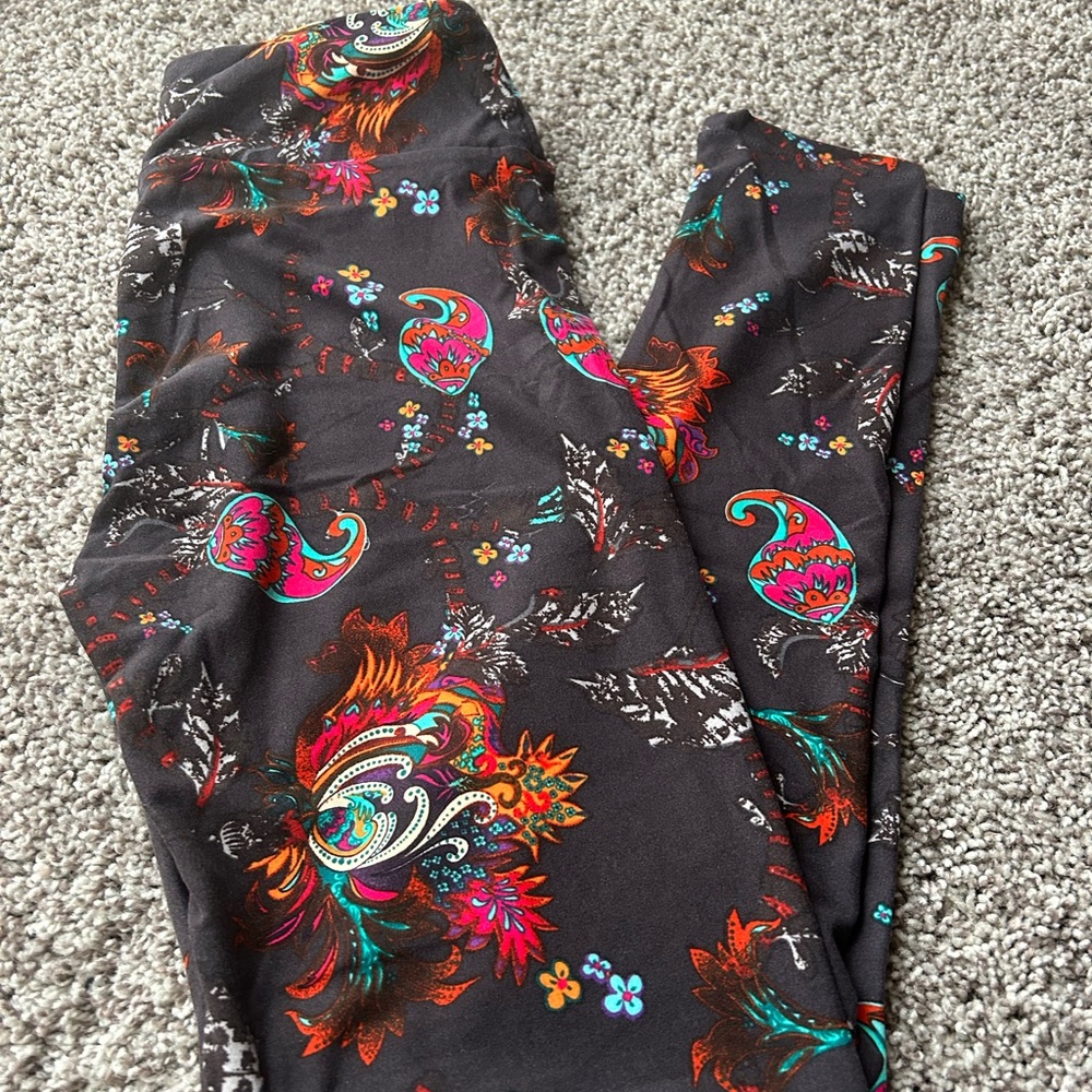 Brand new, never worn LuLaRoe leggings. Brown with vibrant paisley print!